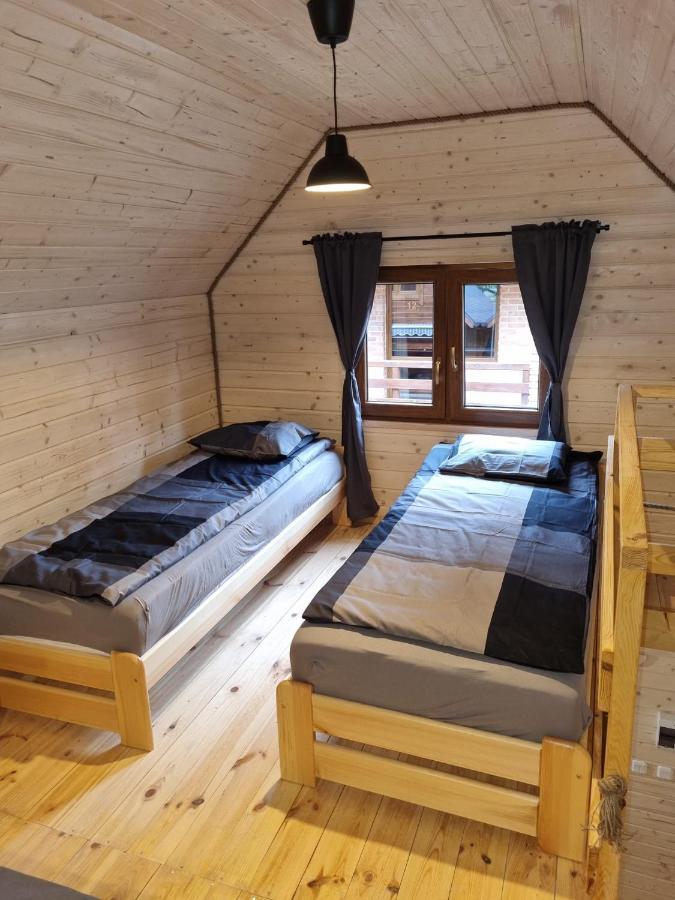 Domki Pod Debami Pobierowo Exterior foto